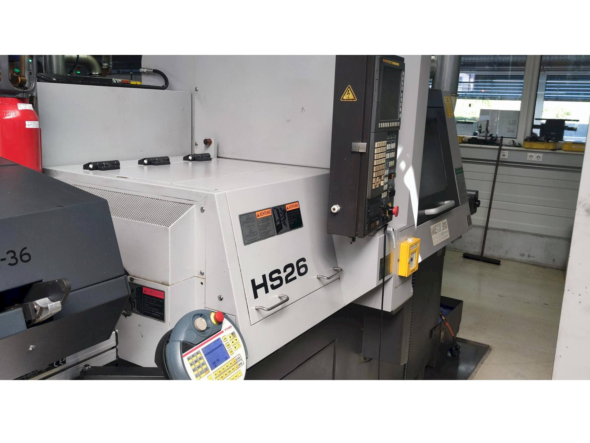 Levý boční pohled  na TSUGAMI HS26  stroj