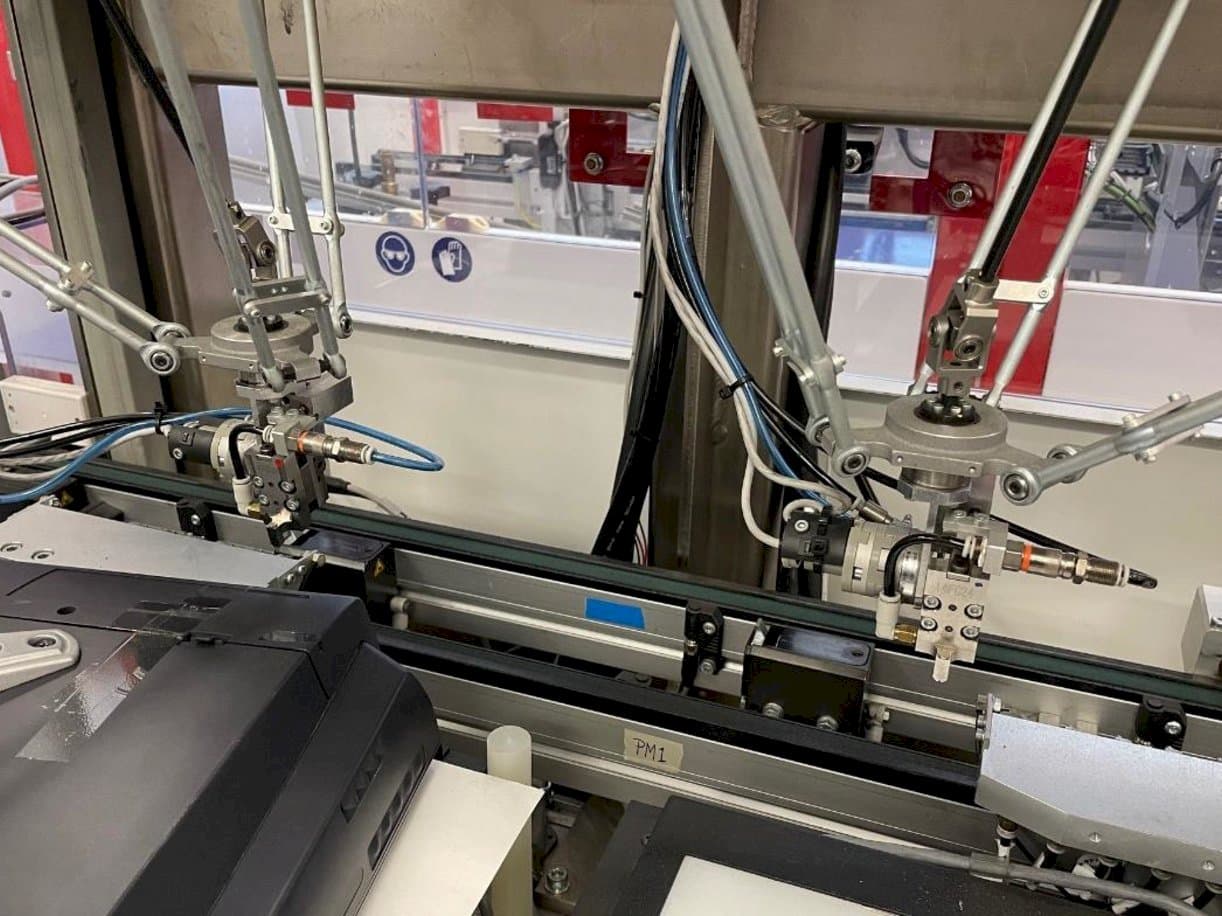 Čelní pohled  na IMS Tattoo Assembly Line  stroj