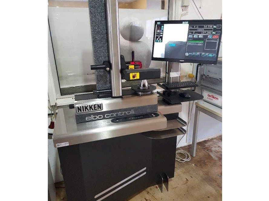 Čelní pohled  na NIKKEN elbo controlli kyan-TW  stroj