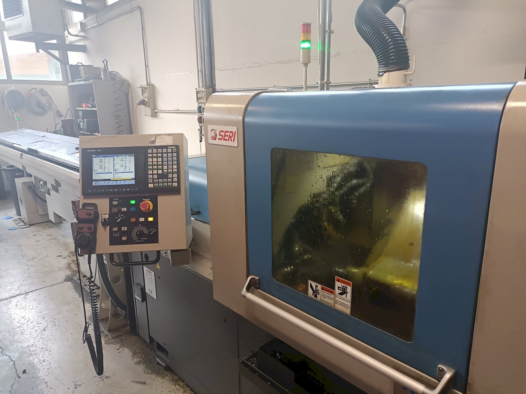 Čelní pohled  na NOMURA   stroj