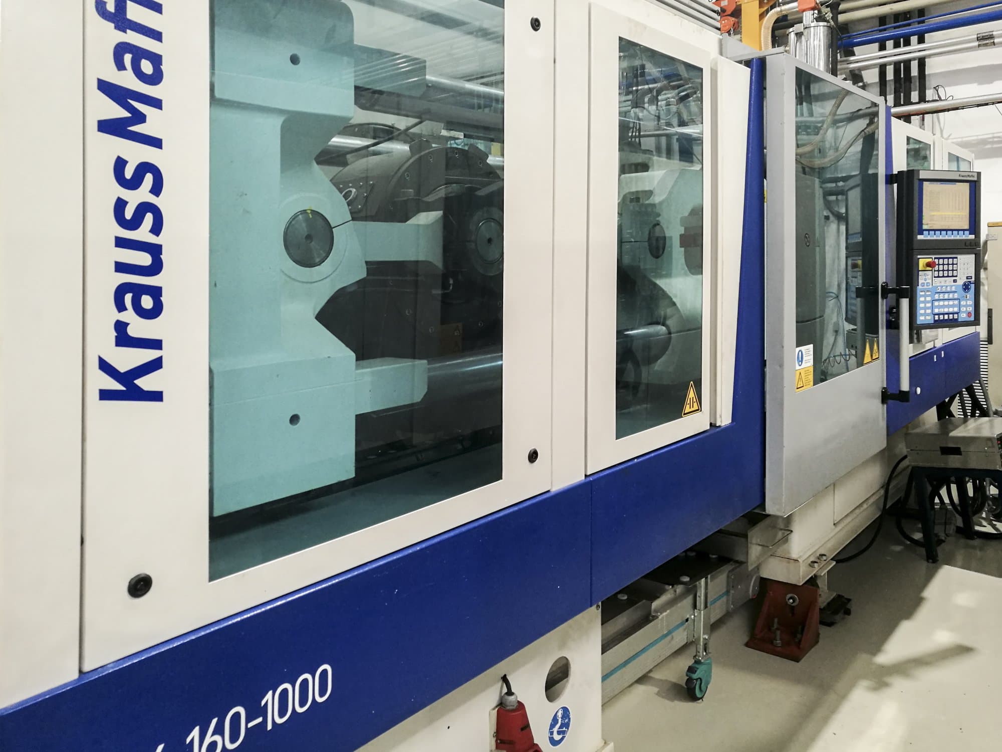 Levý pohled  na Krauss Maffei 160-1000 EX stroj
